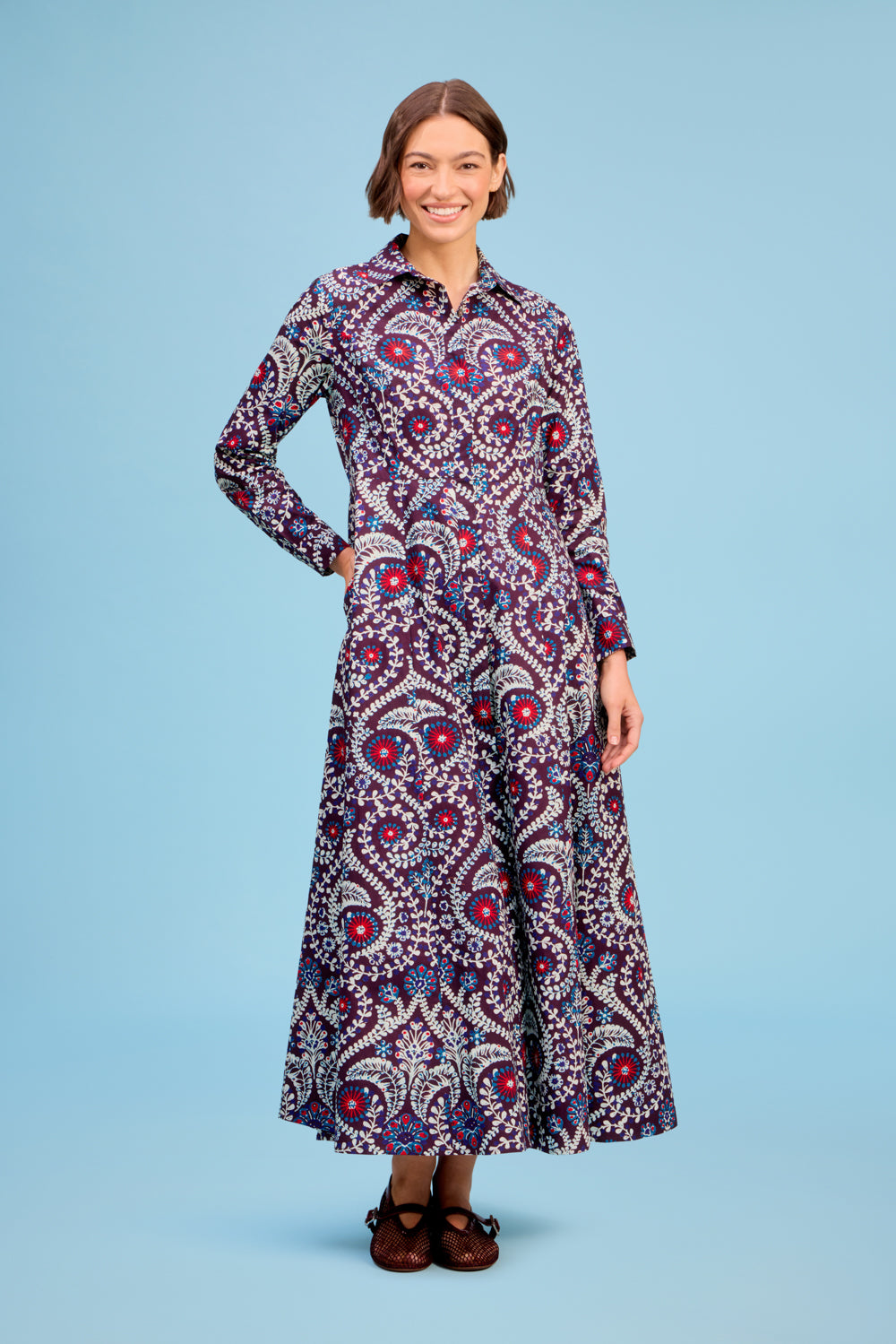 Model wearing Livro Classic Shirtdress in Scroll, front view.