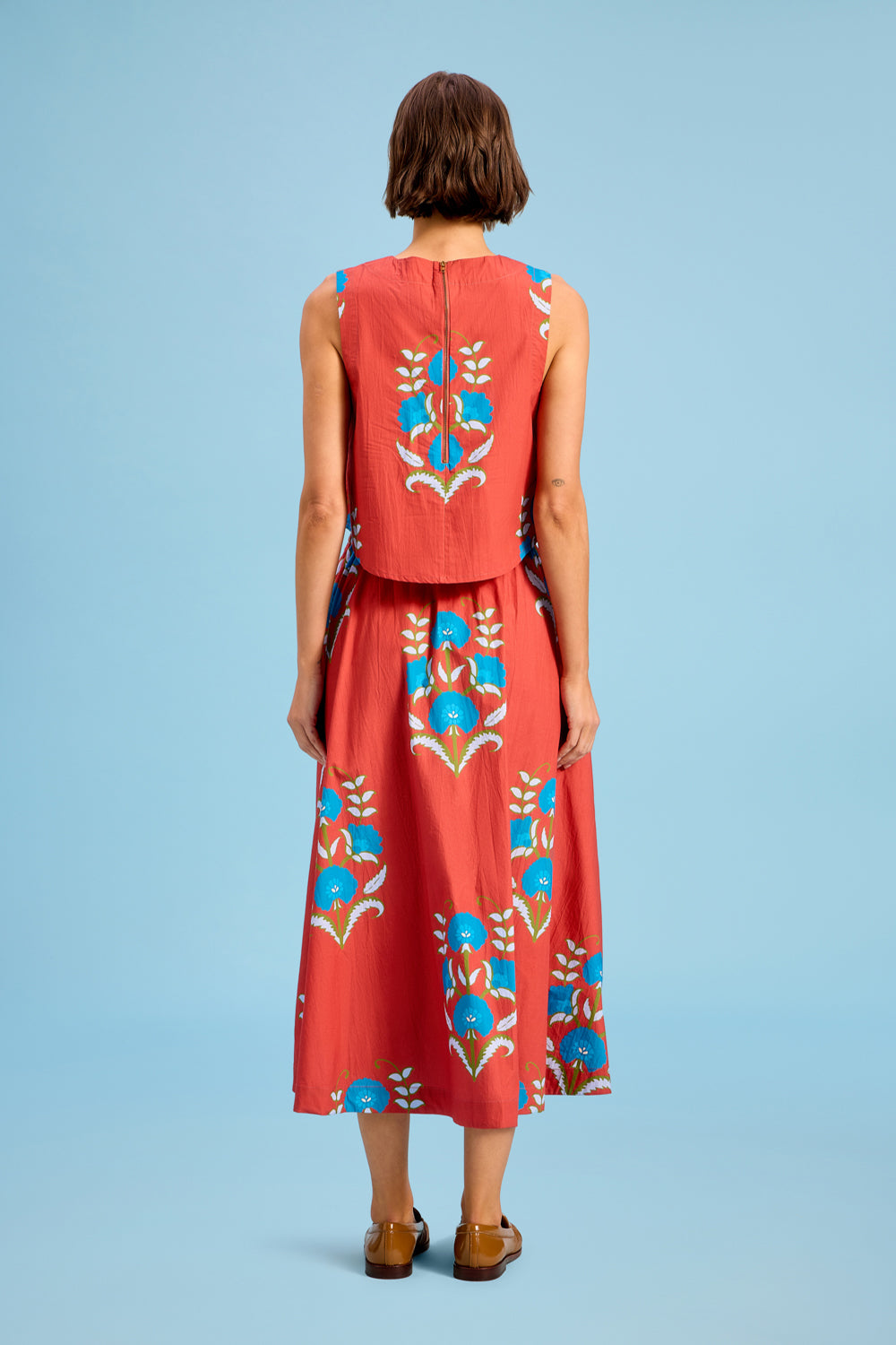 Model wearing Livro Pavilion Skirt in Cinnaleaf, back view